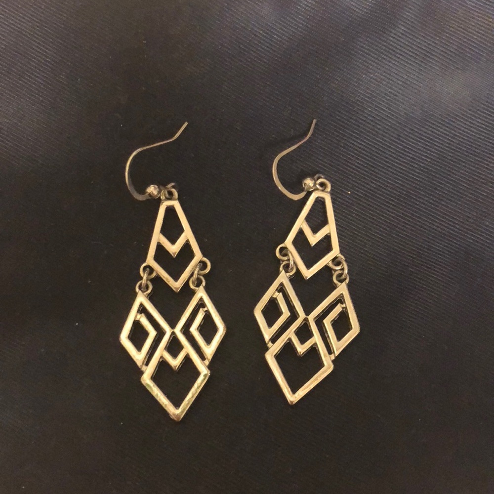 Silver geometric earrings.